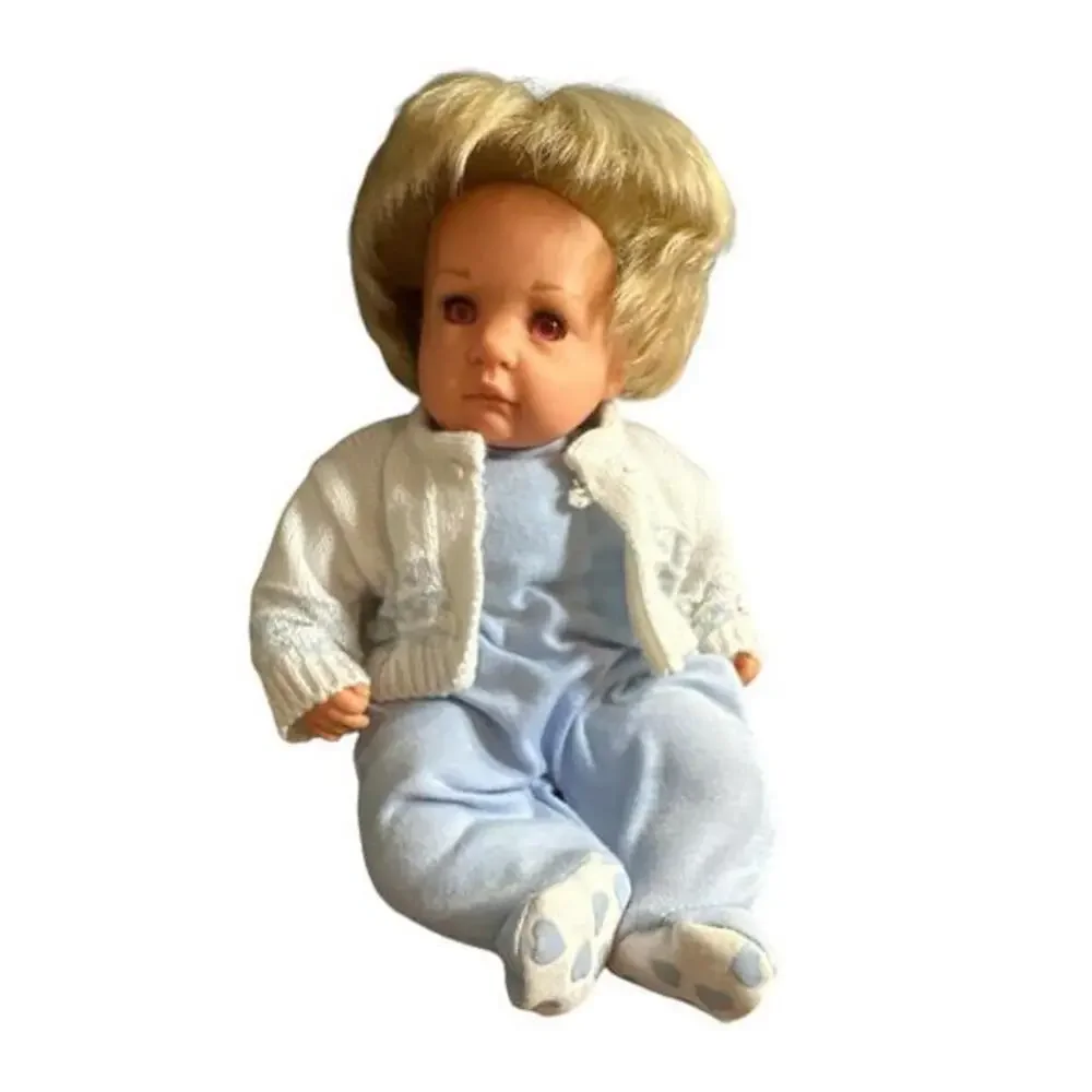 This Gotz doll is a beautiful vintage toddler baby with blonde straight hair and